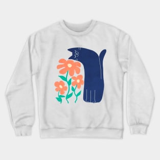 cat smelling flowers Crewneck Sweatshirt